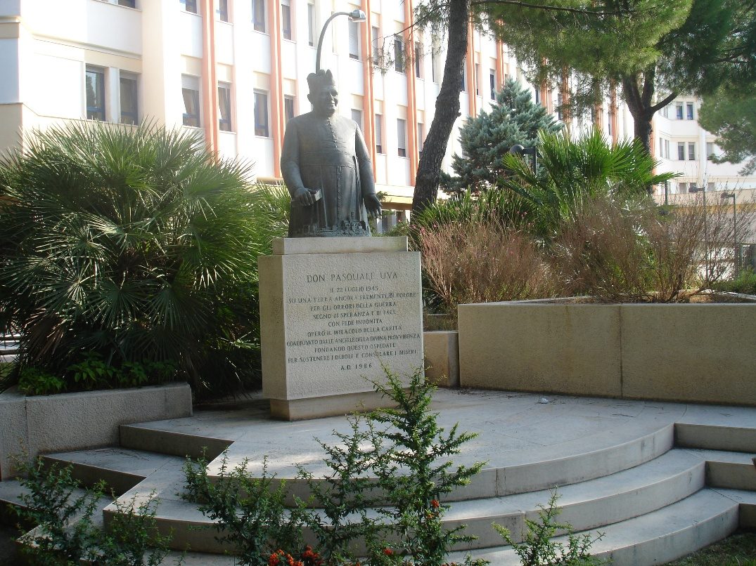 DON UVA'S BUST IN THE GARDEN (1).JPG